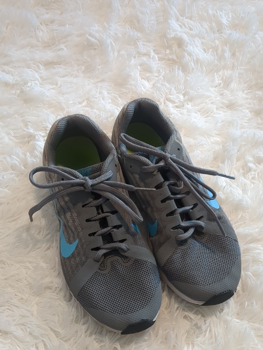 Nike Grey Shoe with Blue Swoosh and Lime Green Insole